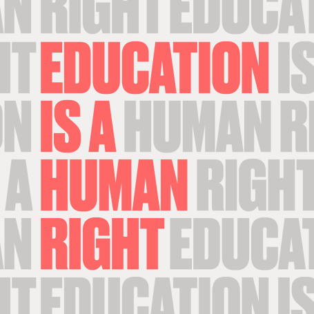 Text graphic stating "Education is a human right" in bold red against a grey background.